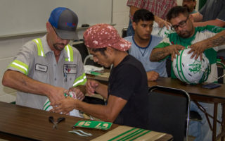Buckaroos, parents add helmet decals