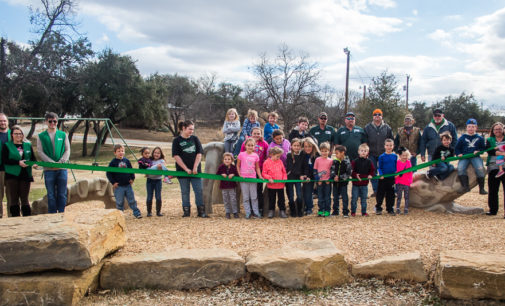 Ribbon cutting in city park makes dinosaur official