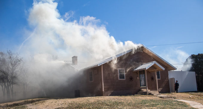 House fire and grass fire keep local firefighters busy