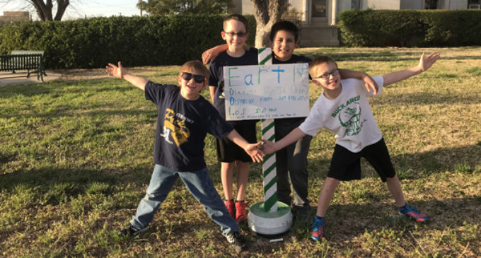 Local Cub Scouts install solar system project