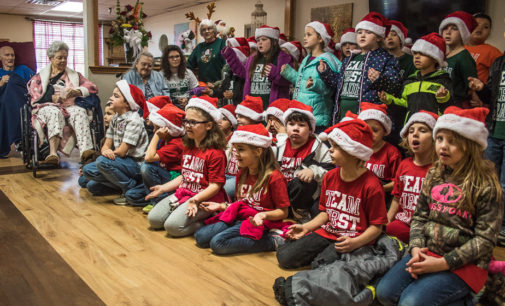 First graders spread Christmas cheer at Villa Haven