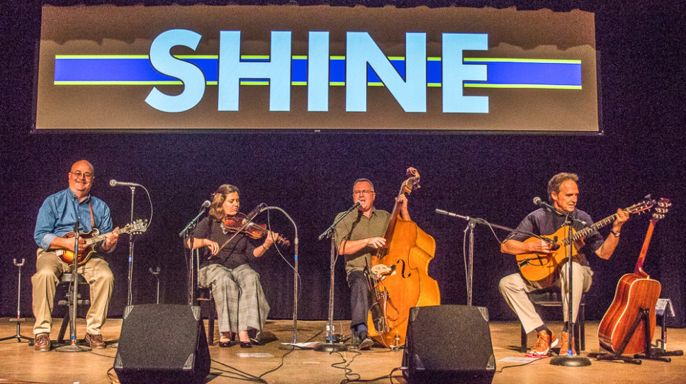 Shine performs at the National Theatre