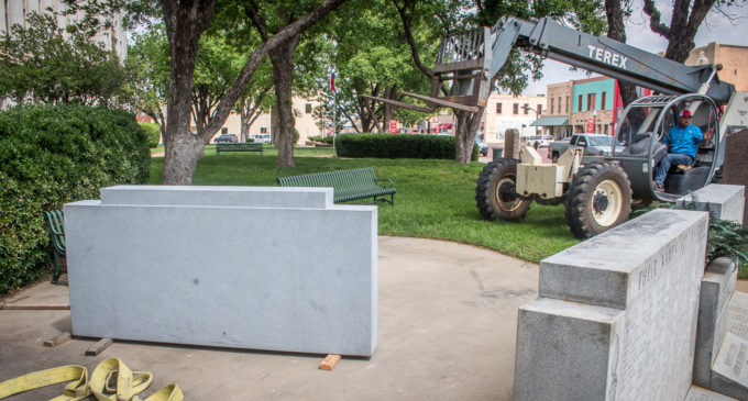 Workers install new monument stone at Stephens County Veterans Memorial