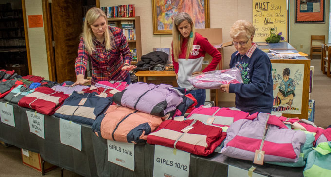 Local Elks Lodge provides coats, books for kids through Warm the Library project