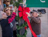 St. Andrew’s members clean up and decorate downtown for Christmas