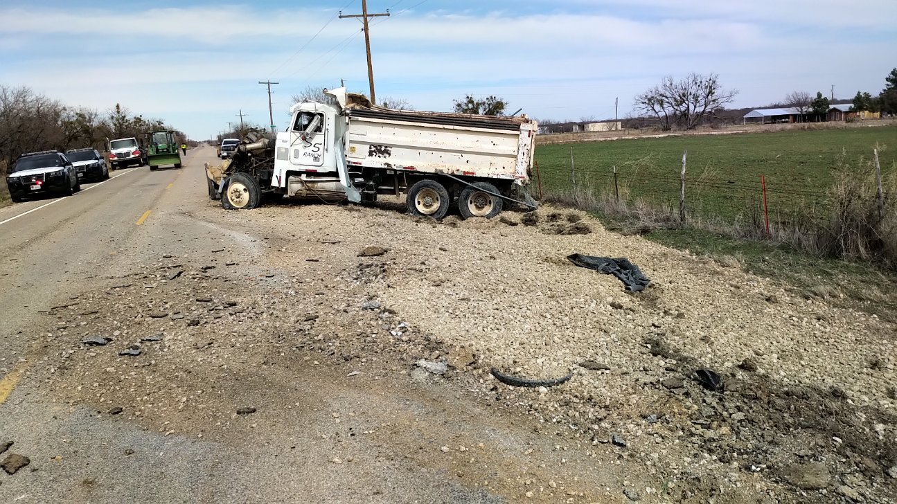Dump truck driver transported by helicopter following onevehicle