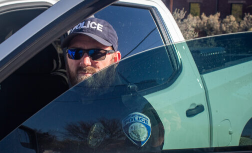 Local business owner provides shade for local police officers