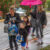 Rain, umbrellas and first day of school in photos