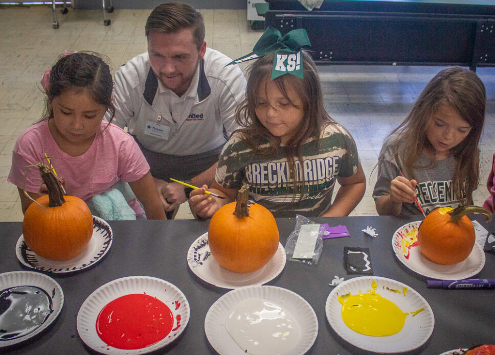 Painting pumpkins at East Elementary