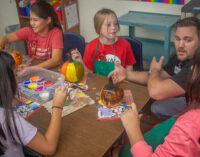 Community Halloween activities scheduled for tonight; South Elementary kids paint pumpkins