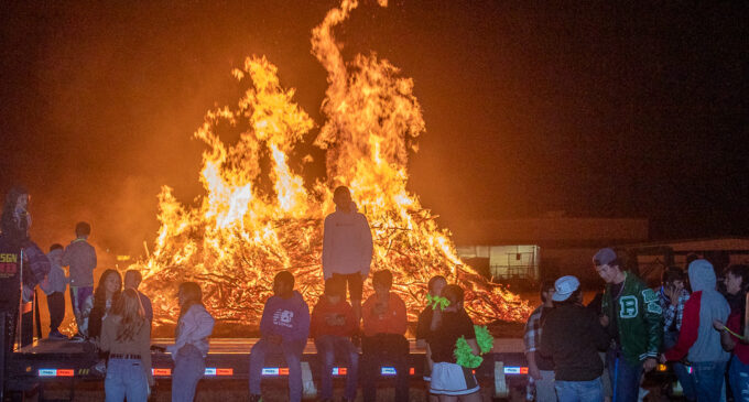 Students and fans get fired up at bonfire and pep rally as Bucks head to playoff game