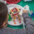 Second-graders decorate gingerbread houses