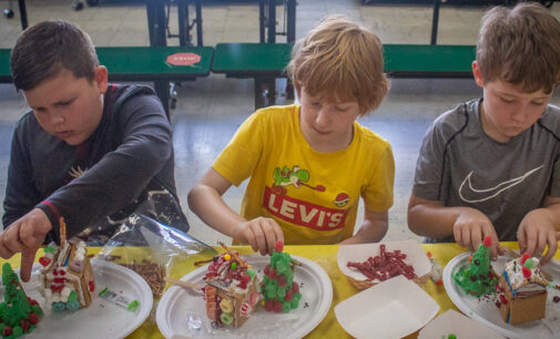 Second graders decorate holiday gingerbread houses; more Christmas events planned for this week
