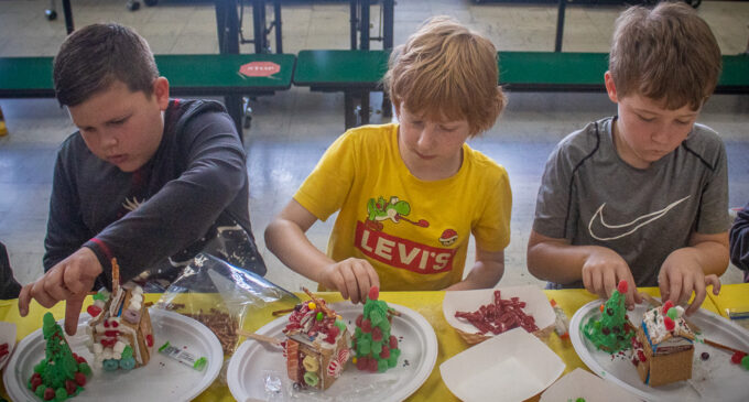 Second graders decorate holiday gingerbread houses; more Christmas events planned for this week