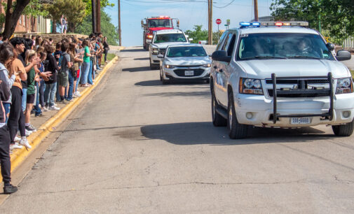 Buckaroo fans cheer on track athletes as they leave for State competition in Austin