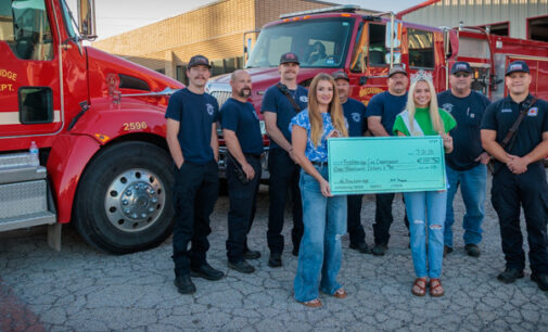 Miss Breckenridge presents pageant donation to Fire Dept.