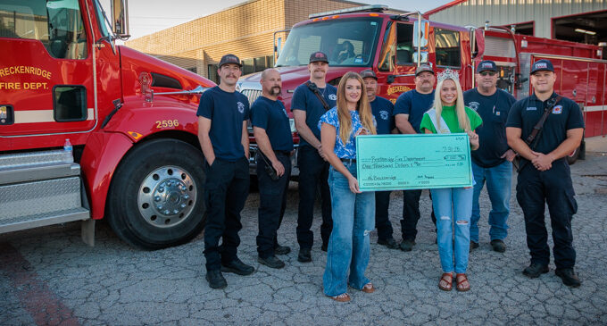 Miss Breckenridge presents pageant donation to Fire Dept.