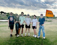 Local Scouts work on golfing merit badge