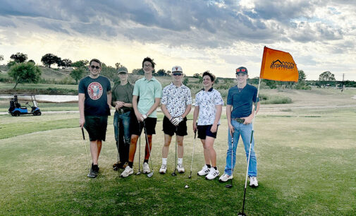 Local Scouts work on golfing merit badge