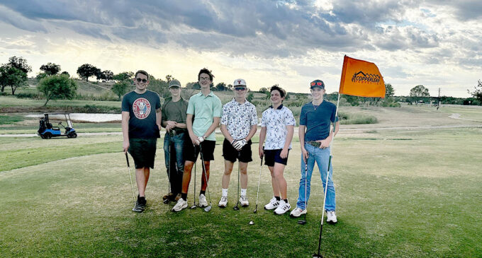 Local Scouts work on golfing merit badge