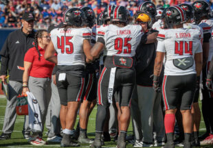 Louisville Cardinal Jerry Lawson in Dallas – Photos by Tony Pilkington and Brant Thurmond
