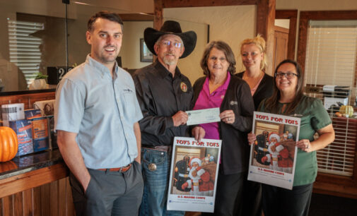 Graham Savings staff kicks off Toys for Tots campaign with donation to local program