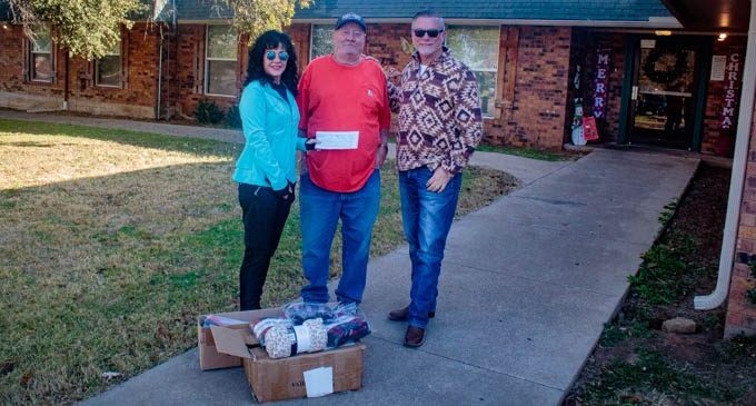 Terry McCoy donates blankets, grabbers to Villa Haven residents; Rotary Club helps with donation