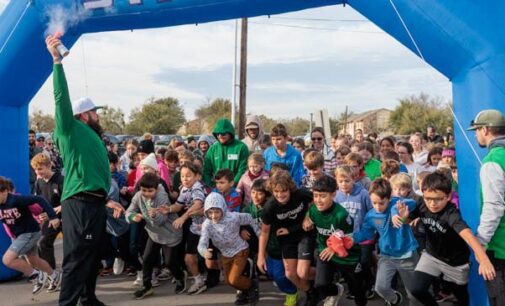 South Elementary students hit the streets for annual Turkey Trot race, after weather delay