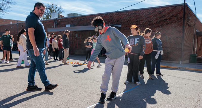 Local junior high kids don ‘drunk goggles’ to experience how alcohol can impair their vision, coordination