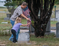 Volunteers place flags on veterans’ graves; Memorial Day ceremony set for Monday at Stephens County courthouse