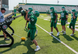 Pictures, football and watermelon at 2026 Buckaroo Watermelon Scrimmage
