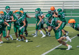 Pictures, football and watermelon at 2026 Buckaroo Watermelon Scrimmage