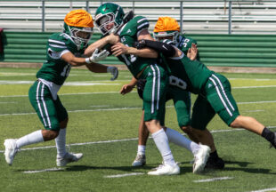 Pictures, football and watermelon at 2026 Buckaroo Watermelon Scrimmage